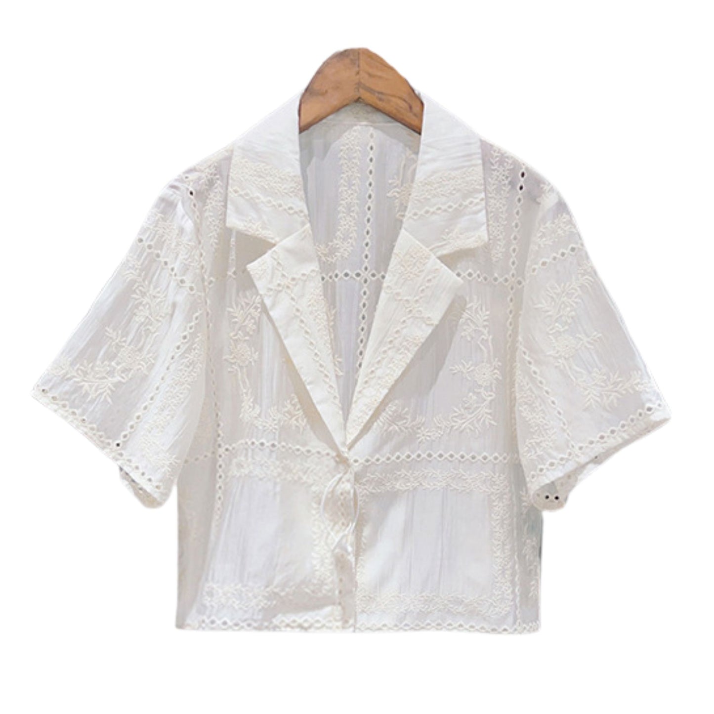 Elegant, skir, broderad lyxblus