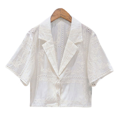 Elegant, skir, broderad lyxblus